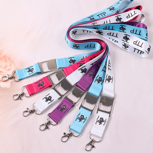 Pink, purple, blue and white printed lanyards with silver-colored detachable buckles and swivel clips