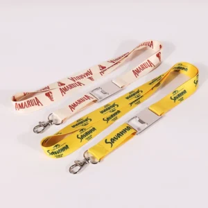 Cream and yellow printed lanyards with branded artwork, metal detachable buckles and swivel clips