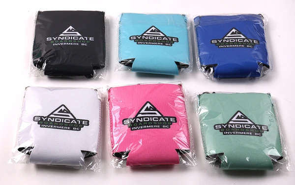 Six flat can coolers in black, turquoise, blue, white, pink and mint, each in clear packaging
