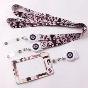 Patterned lanyard set with square logo badge reels and a matching ID card holder