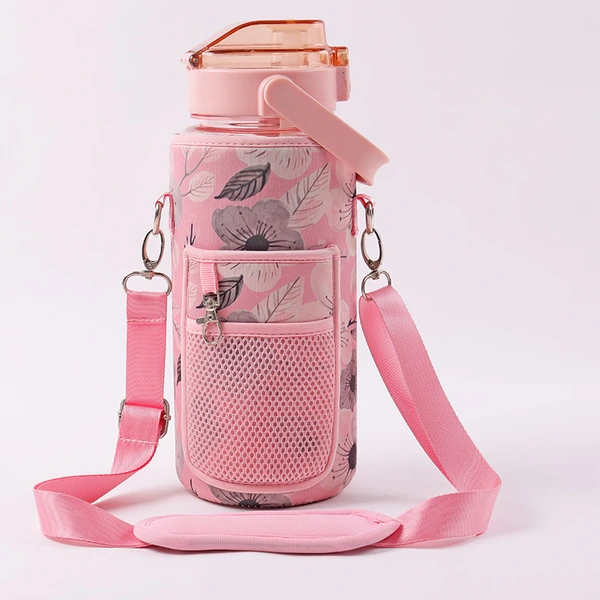 Pink leaf patterned bottle carrier holding a pink water bottle with a mesh front pocket and matching shoulder strap