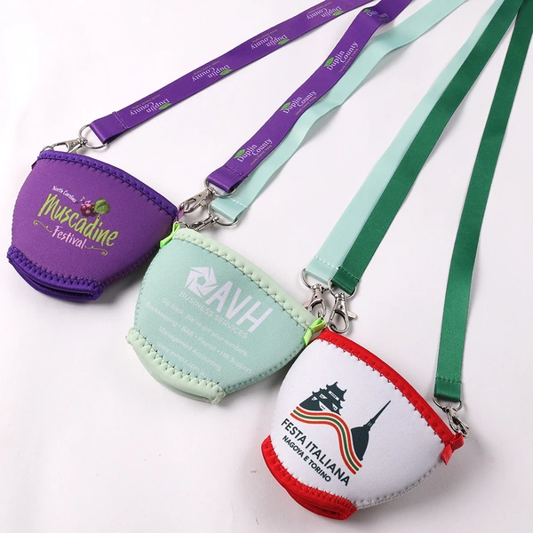Purple, mint and white branded cup sleeves attached to matching colored neck lanyards