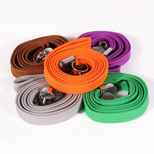 Brown, orange, purple, gray and green lanyards rolled into coils with silver-colored holder rings