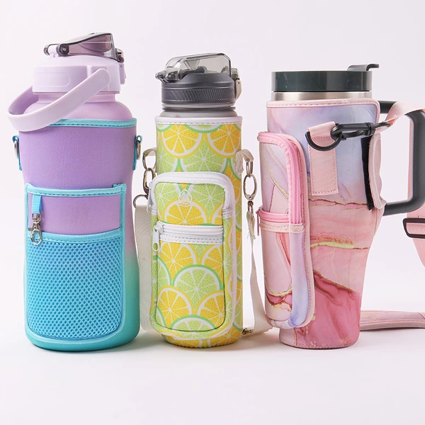 Turquoise, lemon print and pink marble bottle carrier bags with front pockets holding water bottles